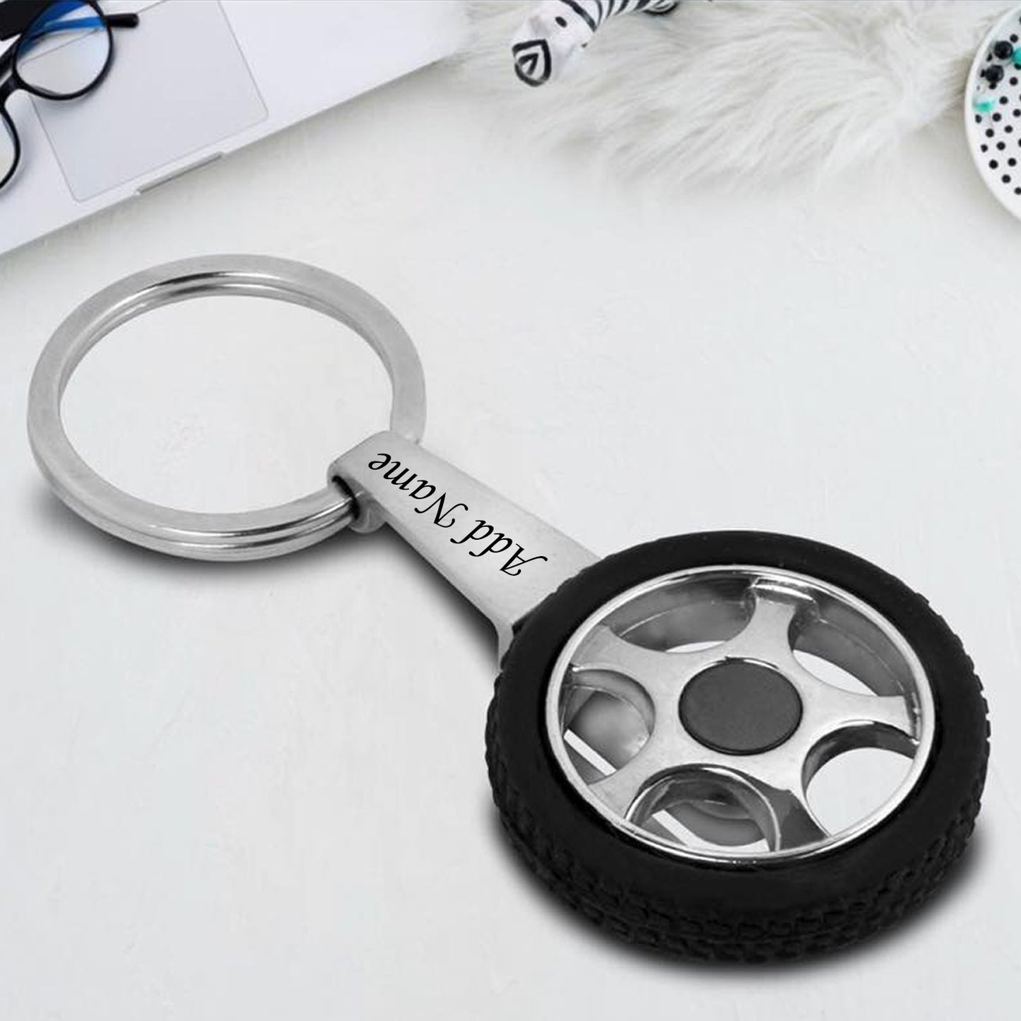 Tyre Shape Rotating Keychain with Chrome Finish